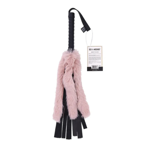 Pink and black leather whip with a brand tag on a white background
