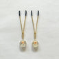 Gold nipple clamps with globe resin charm containing dried flowers – PurpleNight.ca