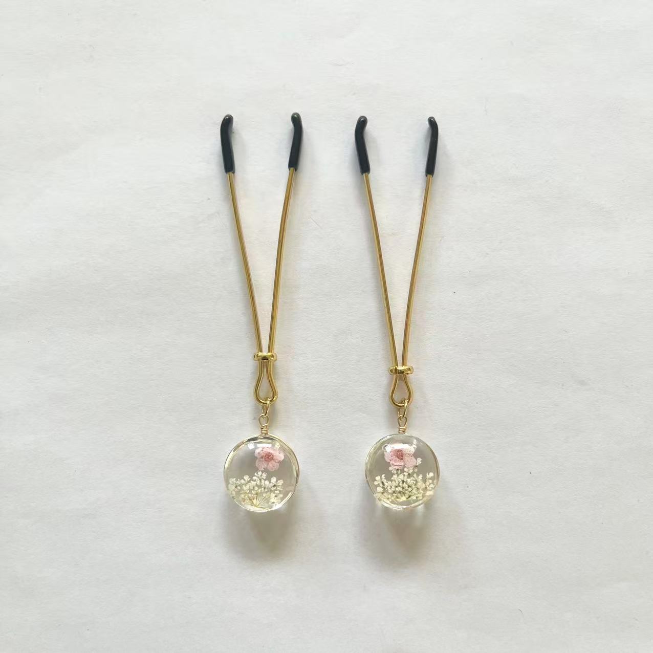 Gold nipple clamps with globe resin charm containing dried flowers – PurpleNight.ca