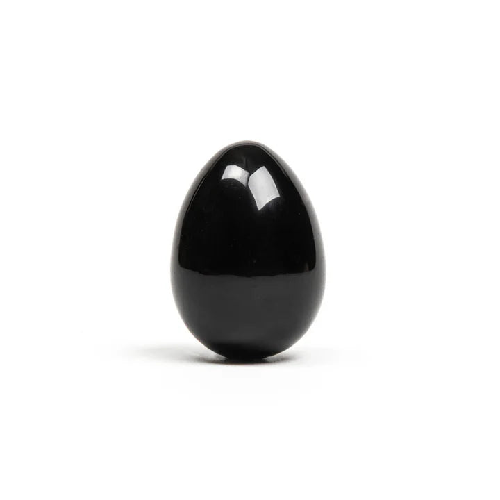 Black obsidian yoni egg with smooth polished crystal finish