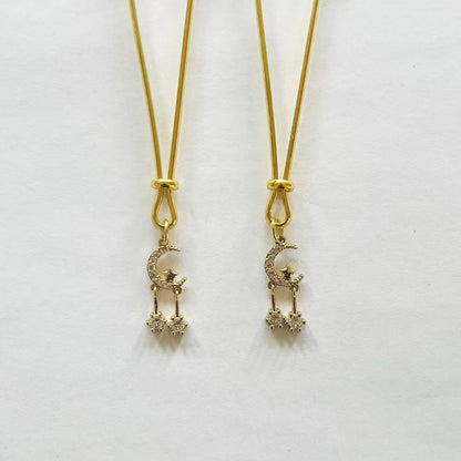 Gold nipple clamps with rhinestone crescent moon and double dangling star chains – PurpleNight.ca