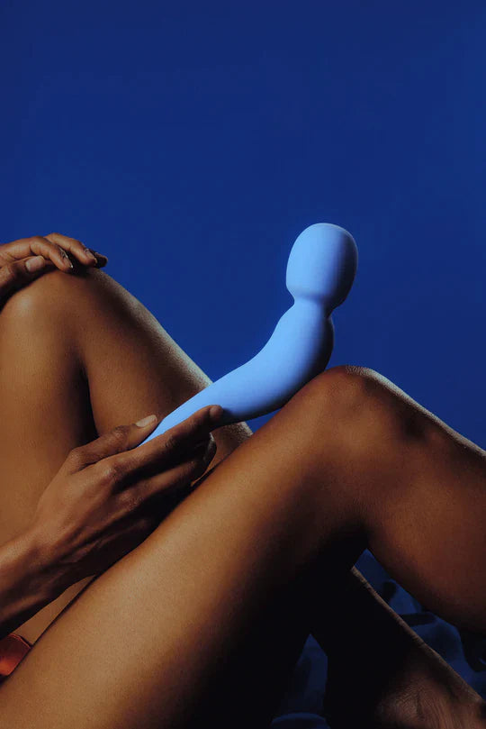 Dame Com Wand Vibrator in matte silicone with curved handle