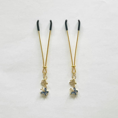 Elegant gold nipple clamps with blue crystal flower and butterfly charm – PurpleNight.ca