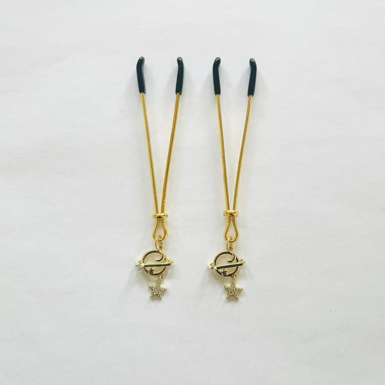 Gold nipple clamps with orbit planet and dangling star charm – PurpleNight.ca