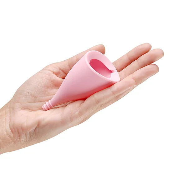 INTIMINA Lily Cup menstrual cup in pink with angled shape and smooth design