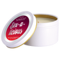 A white soy massage oil candle with a gold lid, labeled 'Sex-A-Licious Ravenous Raspberry' by Jelique.