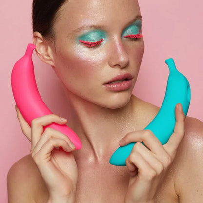 Love to Love Oh Oui Banana Vibrator –  banana-shaped vibrator on neutral background, playful and colorful.