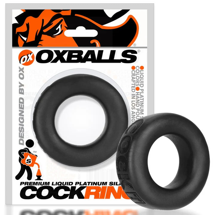 Black cock ring with OX Balls packaging on a white background
