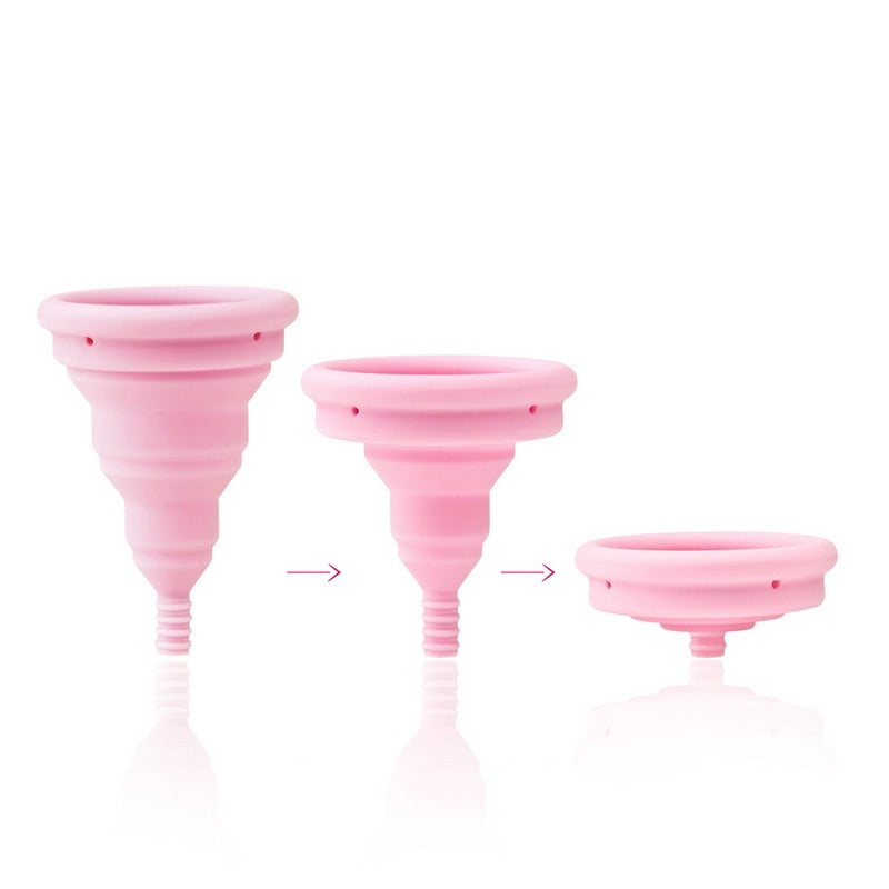 INTIMINA Lily Cup Compact collapsible menstrual cup with pink case, shown folded and open