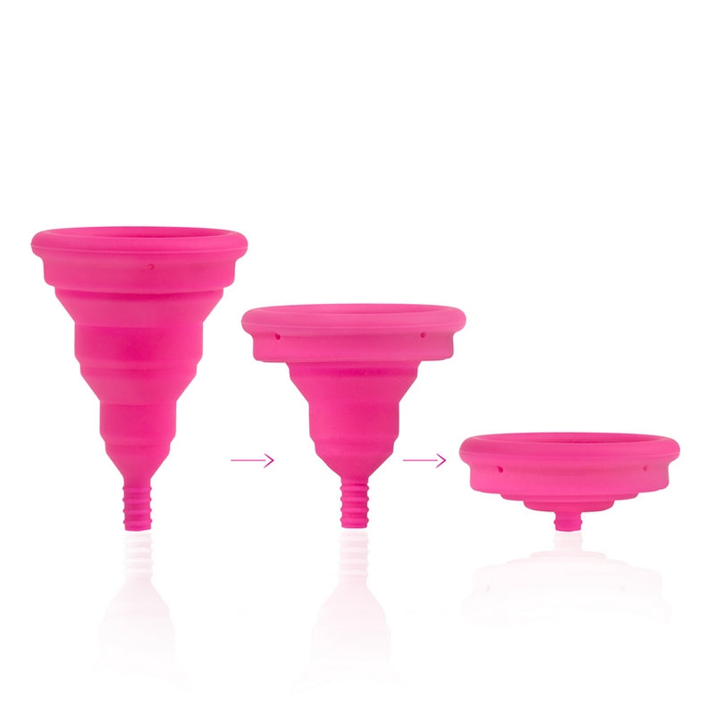 INTIMINA Lily Cup Compact collapsible menstrual cup with pink case, shown folded and open
