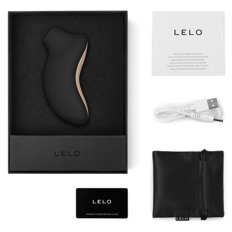 LELO product packaging with device, USB cable, warranty card, and carrying case on a white background.