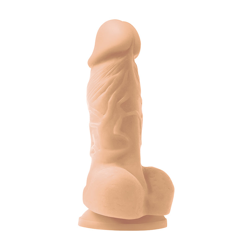 Beige silicone mold shaped like a human figure on a white background