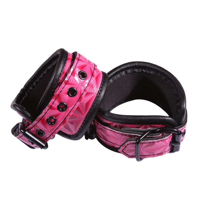 NS Novelties Sinful Ankle Cuffs in pink faux leather with soft neoprene padding