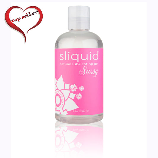 Bottle of Sliquid Naturals Sassy Natural Lube with a pink label and flower design.