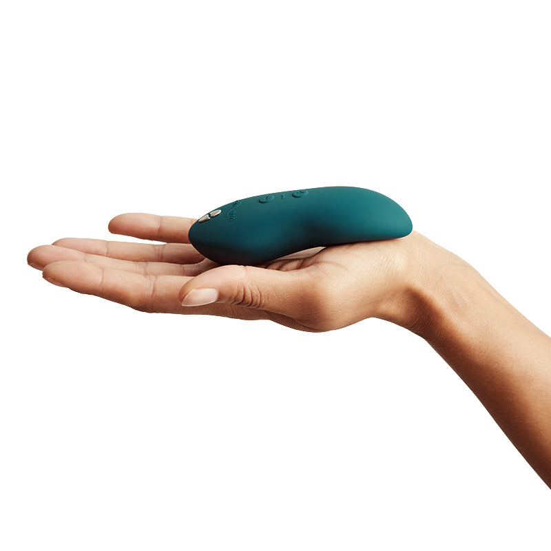 We-Vibe Touch X Vibrator in Crave Coral – soft silicone body vibrator with ergonomic design