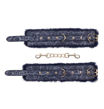 Navy blue faux fur bondage handcuffs with gold hardware by Sex & Mischief
